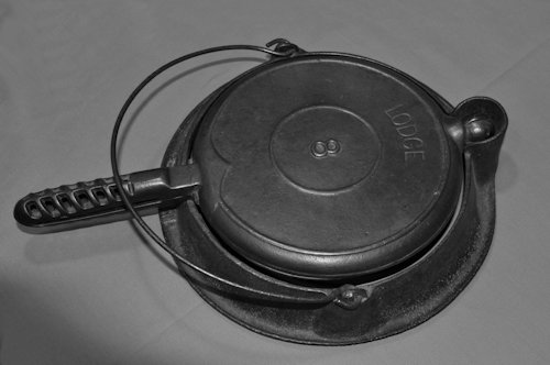 A Vintage Cast Iron Waffle Maker 